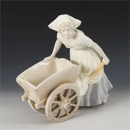 Meisje met kruiwagen. Weense manufactuur Friedrich Goldscheider