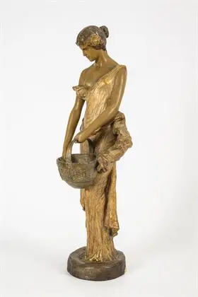 Vrouw met handvatmand. Weense manufactuur Friedrich Goldscheider