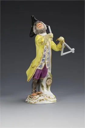 Monkey playing triangle. Meissen