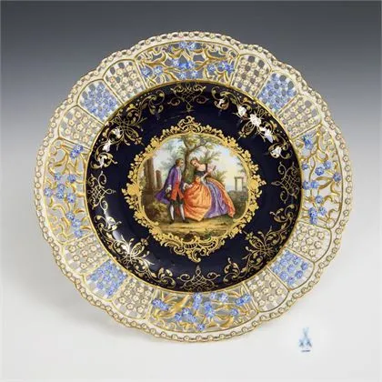 Pierced plate with cobalt ground and Watteau painting. Meissen