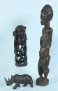 Africké figurky, 3 kusy – dřevo, tmavě mořené, v= 11-62 cm, nosorožec, strom života a figura předka