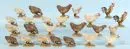 Coqs et poules, 24 pièces – bois, polychrome, H= 7-10 cm