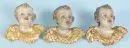 Têtes d'anges, 3 pièces – bois, polychrome, ailes dorées, H= 14 cm, style baroque, 20e s.