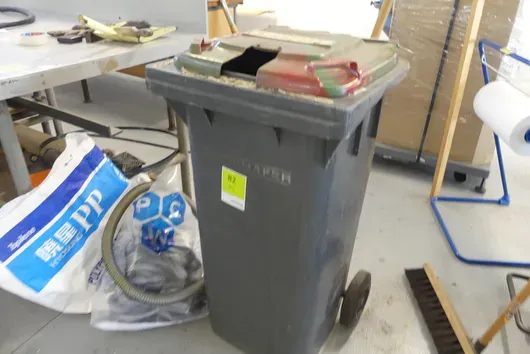 Waste bin, with contents