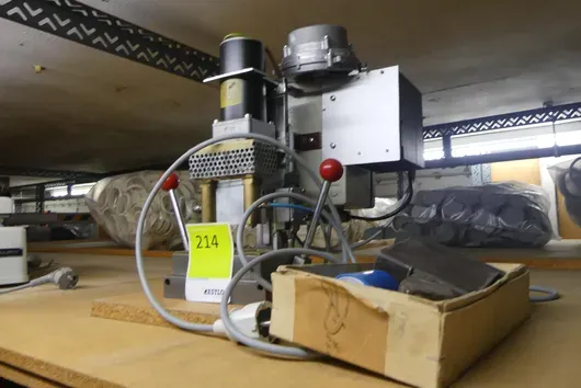 probably small assembly or punching device