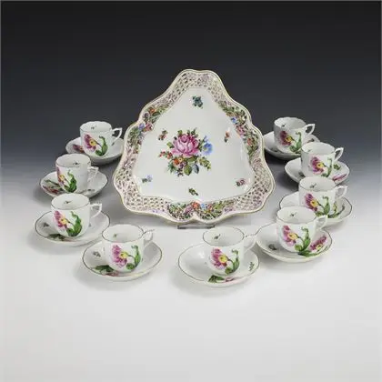 Triangular bowl and 9 mocha cups with floral painting. Herend