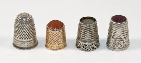 Vingerhoedjes goud en zilver