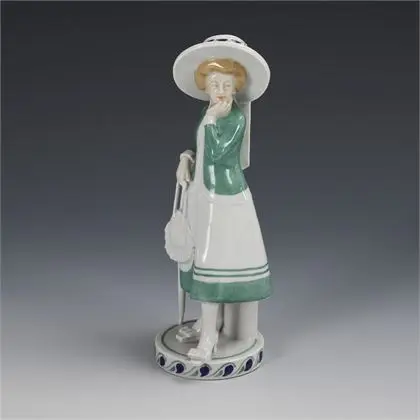Figurine Art nouveau : dame avec sac et canne. Schwarzburger Werkstätten
