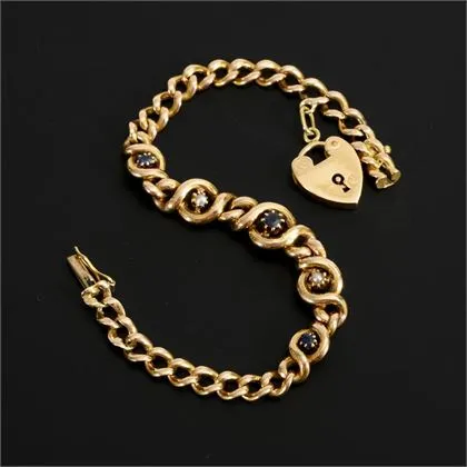 Armband omstreeks 1900 met hartenhanger