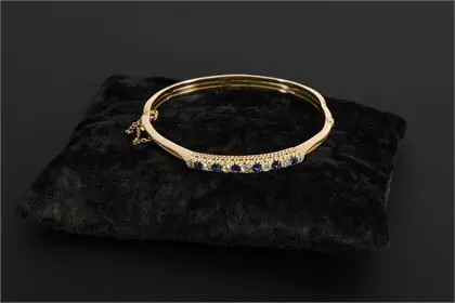 Kwaliteitsvolle armband met oudgeslepen diamanten en blauwe stenen, waarschijnlijk saffieren