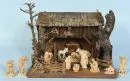 Weihnachtskrippe – Holz, 34 x 44 x 31 cm, mit 12 Holzfiguren, H= 3-10 cm;