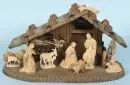 Crèche de Noël – bois teinté brun, 20 x 36 x 18 cm, avec 7 figurines en bois, H= 2,5-10,5 cm