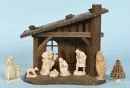 Weihnachtskrippe – Holz, braun gebeizt, 22 x 23 x 12 cm, mit 7 Holzfiguren, H= 2-8 cm;