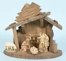 Weihnachtskrippe – Holz, braun gebeizt, 23 x 27 x 13 cm, mit 4 farbig gefassten Holzfiguren, H= 3-9,5 cm;