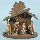 Weihnachtskrippe – Holz, braun gebeizt, 25 x 27 x 13 cm, mit 4 farbig gefassten Holzfiguren;