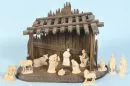 Weihnachtskrippe – Holz, braun gebeizt, 26 x 36 x 19 cm, mit 12 Holzfiguren, H= 2-8 cm;