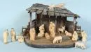 Weihnachtskrippe – Holz, farbig gefasst, 31 x 53 x 34 cm, mit 13 Holzfiguren, H= 3,5-12 cm;