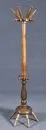 Coat stand – hardwood, dark stained, turned form with umbrella holder and hooks, H= 168 cm;