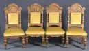 Chairs, 4 pieces – oak, richly carved Renaissance-style decorations, front feet on brass casters, seat and backrest…
