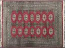 Bouchara, Pakistan, 130 x 170 cm – wool, fine weave, red ground, 2 continuous rows of octagons, multiple borders