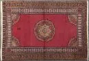 Chorrasan, Persia, 114 x 165 cm – antique, wool, vegetable dyes, red ground, multicolored medallion, multiple borders, signs of wear