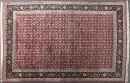 Tapis Kork-Mahi-Täbris, Perse, 204 x 302 cm – laine, tissage très fin, fond rouge, motif continu de motifs stylisés, bordure principale bleu foncé, légèrement sale