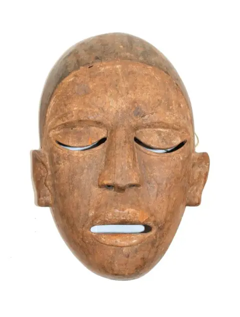 Makonde, – Tanzania wooden mask with blackened hair