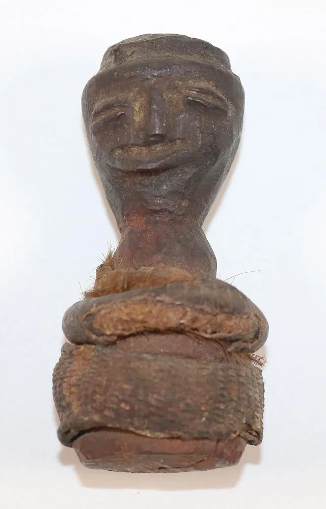 Nkisi – small, old power figure with fabric wrapping