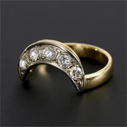 Crescent-shaped ring with old-cut diamonds