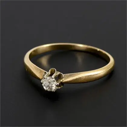 Ring with small old-cut solitaire