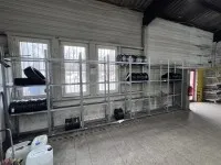 1 lot de rayonnages à pneus, env. 52 m linéaires plus env. 15 montants, démonté
