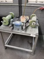 1 mobile table with 3 double bench grinders