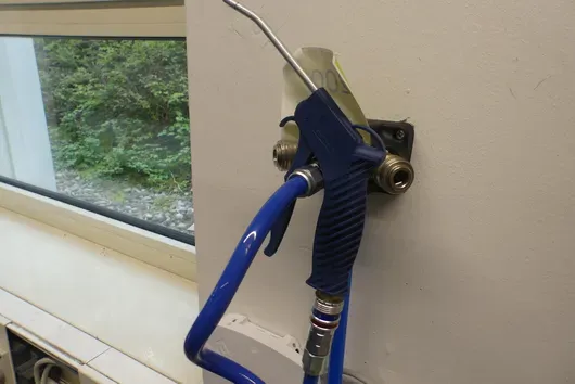 Pistolet à air comprimé avec tuyau