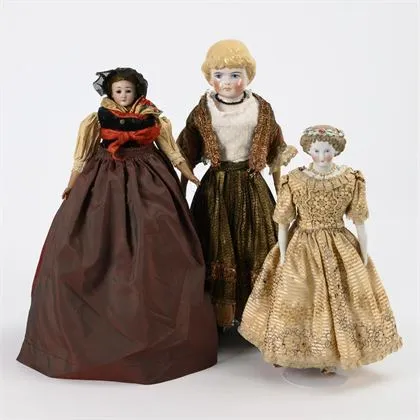 3 poupées à tête de buste