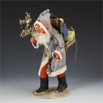 Père Noël avec manteau en feutre
