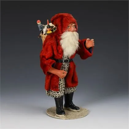 Père Noël avec manteau en velours rouge