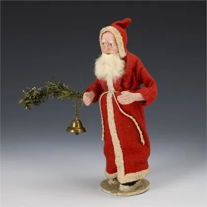 Santa Claus s jedlovou větvičkou a zvonečkem