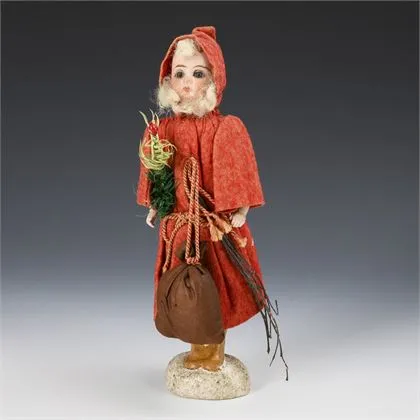 Boîte à bonbons en Père Noël avec tête de poupée