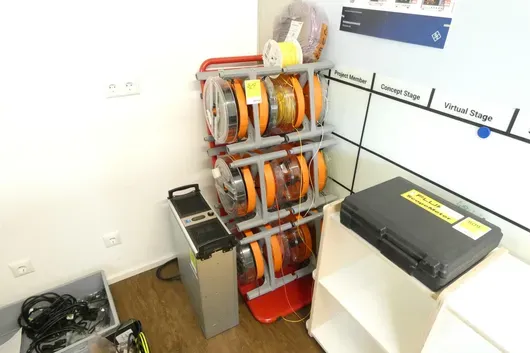 Stand for cable reels, with contents
