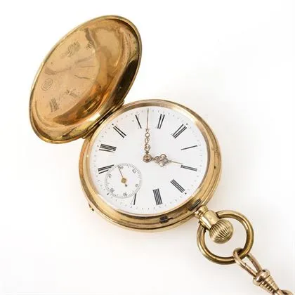 Gold savonnette with gold watch chain