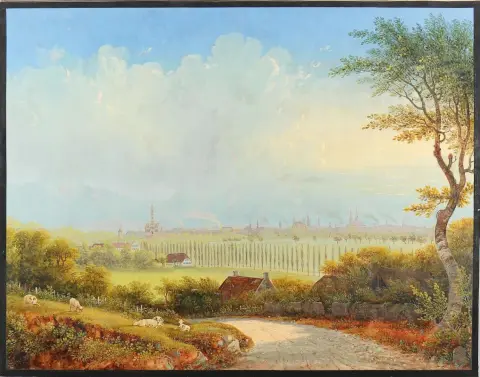 Augsburg. – Panorama of the city with its many church towers seen over a poplar avenue