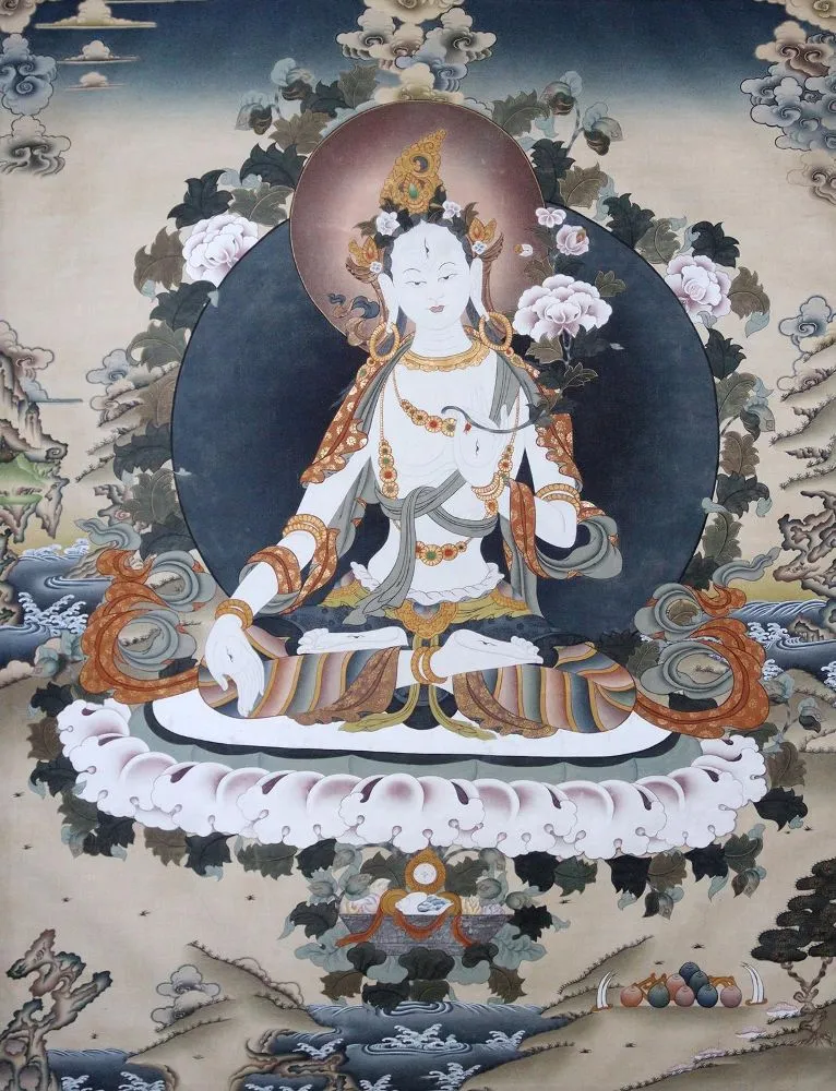 Tara blanche – La déesse bouddhiste de la compassion assise sur un lotus, entourée de plantes dans un paysage idéal