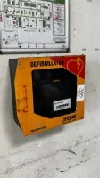 1 defibrillator Medtronic in metal cabinet