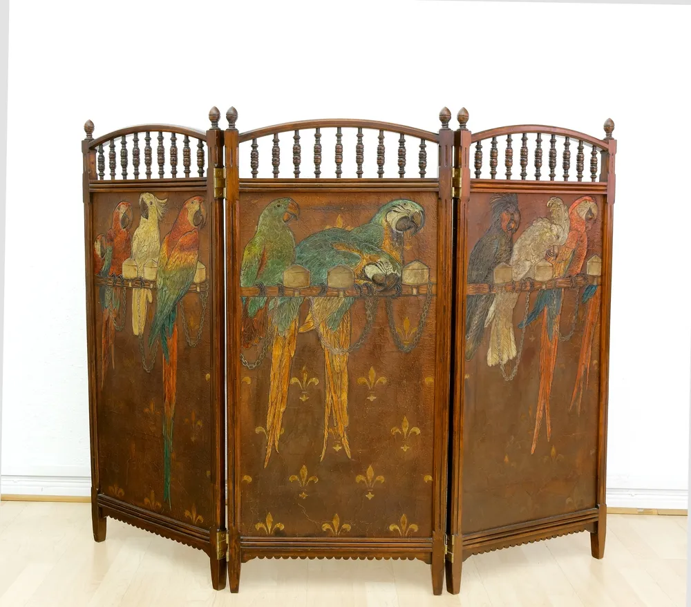 Paravent, three-panel screen, probably Vienna, circa 1900, brown patinated wood, with parrot motifs on leather
