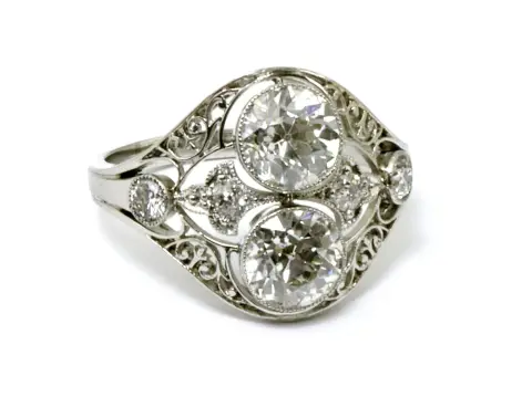 Bague, or blanc 585 avec deux diamants solitaires taille ancienne d'env. 1,5 ct chacun, Wesselton, VS1 et VS2 entourés de quatre petits diamants