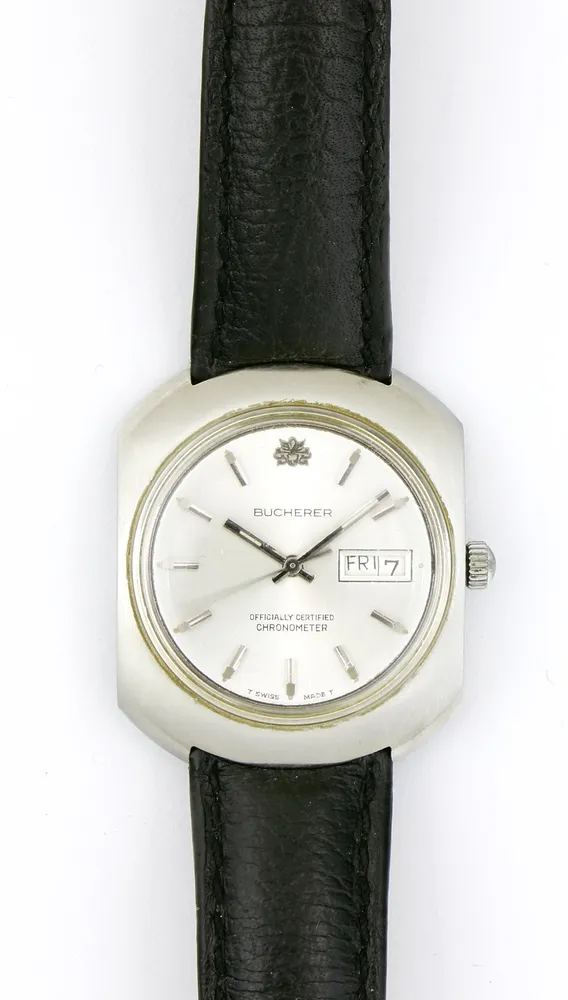 Uhr, Armbanduhr, Bucherer, Stahl Abgerundetes Uhrengehäuse, D ca. 35 mm, Silberfarbenes Ziffernblatt mit Strichzahlen, Tag und…