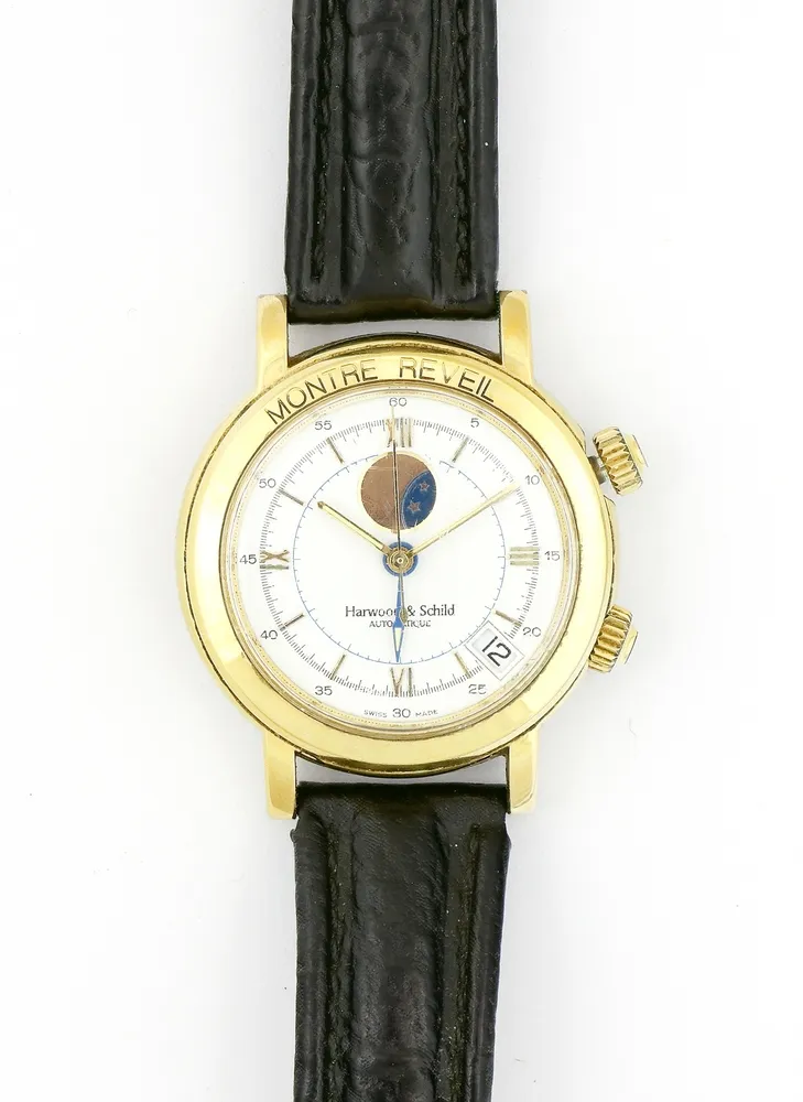 Watch, wristwatch, Harwood & Schild, Montre Reveil, circa 1990, round case, diameter approx. 38 mm. White dial with Roman numerals. Gold-plated. Automatic. Alarm, moon phase, date, chronograph. Limited edition number 736 of 1999. Leather strap. Runs, long-term function not tested. Glass with signs of wear.