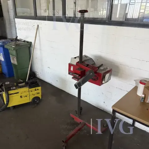 Headlight aiming device HELLA