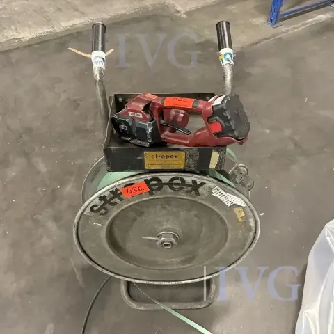 Plastic strapping tool
