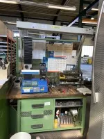 1 workbench with lighting and tool wall